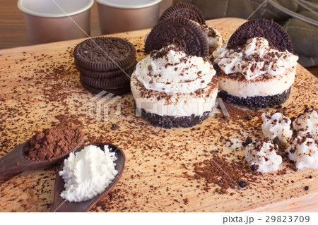 Oreo Cheese Cake and Bakery tools on table 29823709