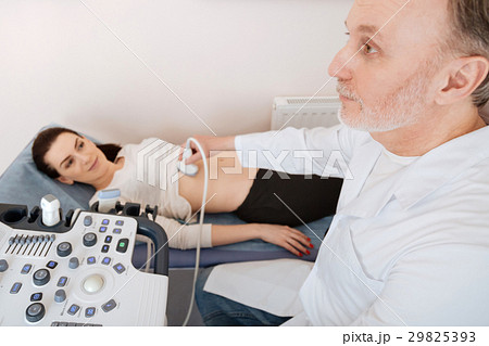 Diligent qualified professional doing his job 29825393