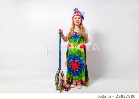 Happy blonde child girl in hippie colorful dress Happy blonde child girl in hippie colorful dress 29827980