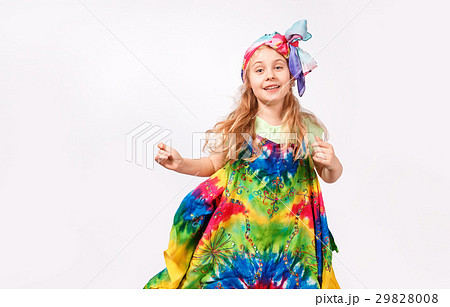 Happy blonde child girl in hippie colorful dress 29828008
