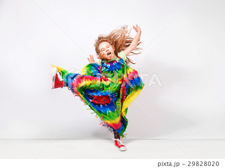 Happy blonde child girl in hippie colorful dress Happy blonde child girl in hippie colorful dress 29828020