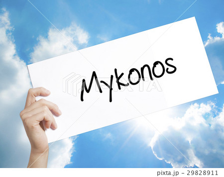 Mykonos Sign on white paper. Man Hand Holding Mykonos Sign on white paper. Man Hand Holding 29828911