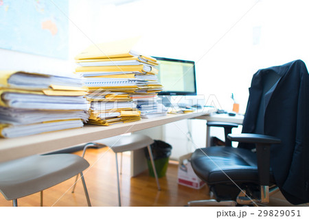 Bundles of documents and folders on commercial office desk Bundles of documents and folders on commercial office desk 29829051