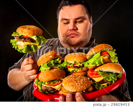 fat people eating burgers