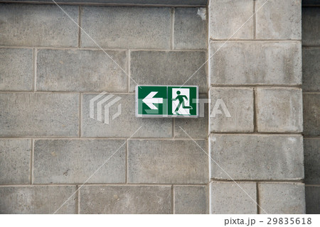 Emergency Fire Exit on the stone wall 29835618