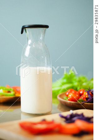 Milk in bottle with vegetables. 29835871