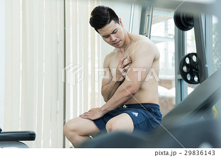 Asian Muscular man having pain on his chest  29836143