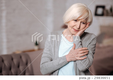 Closeup of very depressed senior lady 29836651