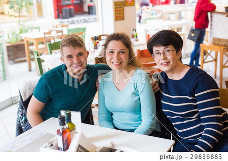 Mother with adult son and daughter Mother with adult son and daughter 29836883