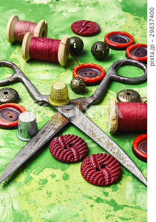 buttons and spool of thread 29837400