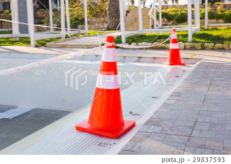 swimming pool repair - safety cone on edge swimming pool repair - safety cone on edge 29837593
