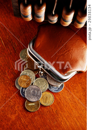 Russian iron coins next to the old brown wallet 29838134