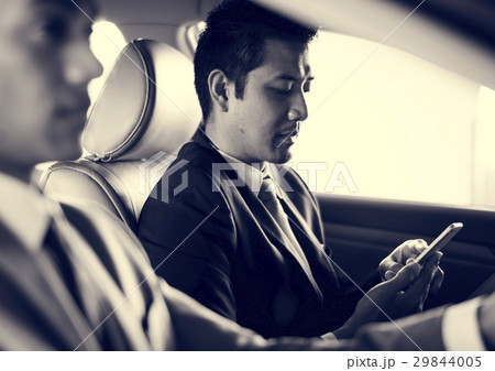 Businessman Use Tablet Inside Car 29844005