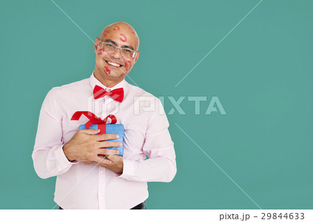Asian Man Cheerful Kisses Present Concept Asian Man Cheerful Kisses Present Concept 29844633