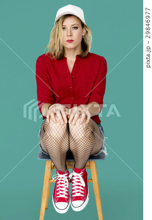 Woman Casual Sitting Studio Portrait 29846977