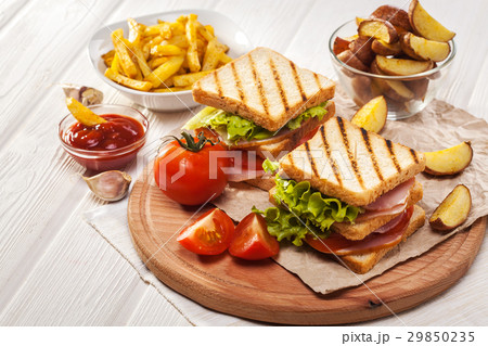 club sandwich with Tomato, lettuce, bacon, ham club sandwich with Tomato, lettuce, bacon, ham 29850235