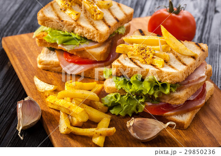 club sandwich with Tomato, lettuce, bacon, ham club sandwich with Tomato, lettuce, bacon, ham 29850236
