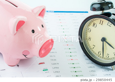 Alarmclock with piggybank, stock market Alarmclock with piggybank, stock market 29850445