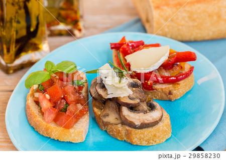 Bruschetta with tomatoes, mushrooms, goat's cheese 29858230