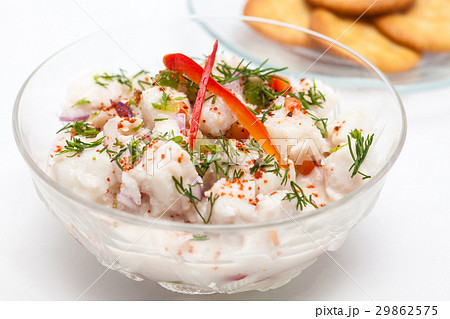 White fish Peruvian ceviche served with crackers 29862575
