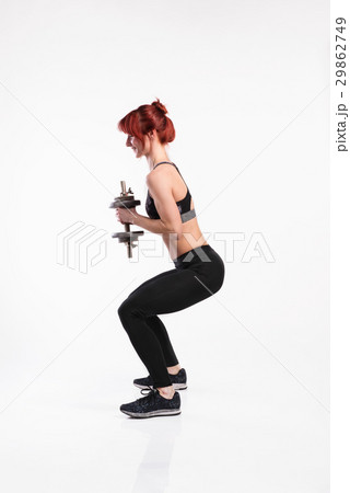 Attractive young fitness woman working out with Attractive young fitness woman working out with 29862749
