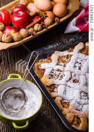 Phase baking apple cake from Grandma. 29862935