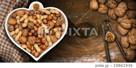 Heart Shaped Bowl with Dried Fruits 29862936