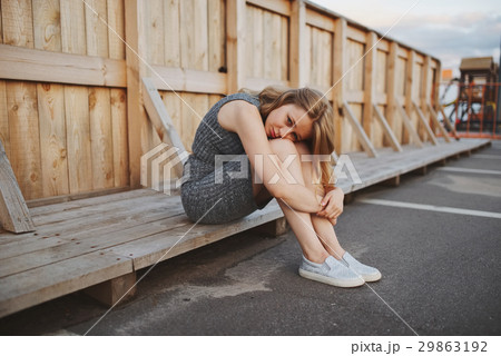 young beautiful blonde girl outdoors 29863192