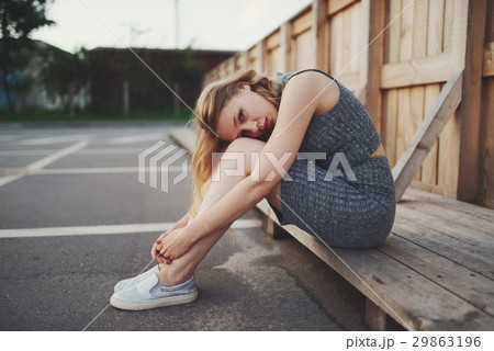 young beautiful blonde girl outdoors 29863196