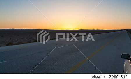 sunset over Desert Highway (Road 15) in Jordan sunset over Desert Highway (Road 15) in Jordan 29864312
