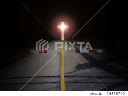 Cut barrier on road crucifix light in darkness Cut barrier on road crucifix light in darkness 29866740