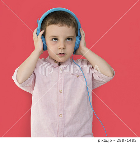 Caucasian Little Boy Trying Headphones 29871485