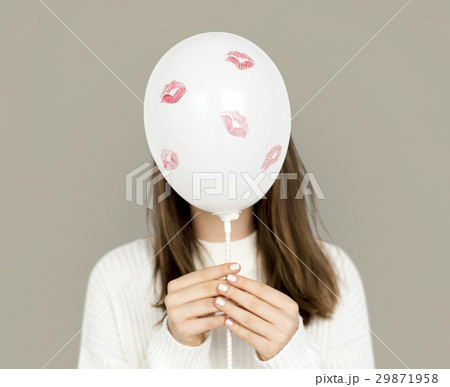 Young Lady Holding Balloon Kiss Marks 29871958