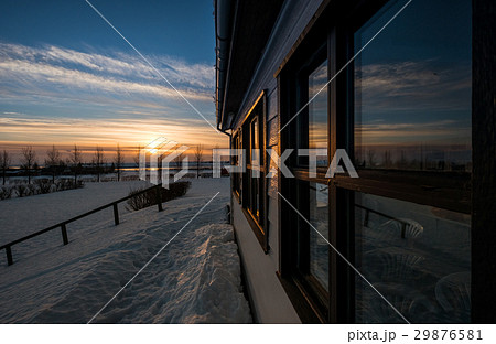Rural house exterior with sunrise in winter 29876581
