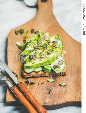 Healthy green veggie sandwich with avocado on Healthy green veggie sandwich with avocado on 29879921
