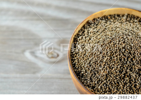 Perilla frutescens or sesame in wood bowl. Perilla frutescens or sesame in wood bowl. 29882437