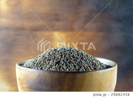 Perilla frutescens or sesame in wood bowl. 29882438