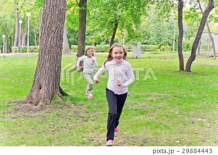 Cute two running girls 29884443