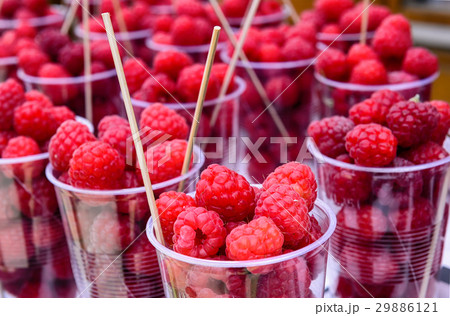 Raspberries sold in plastic cups on the street mar Raspberries sold in plastic cups on the street mar 29886121