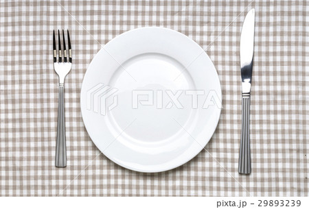 Empty white plate with fork and knife Empty white plate with fork and knife 29893239
