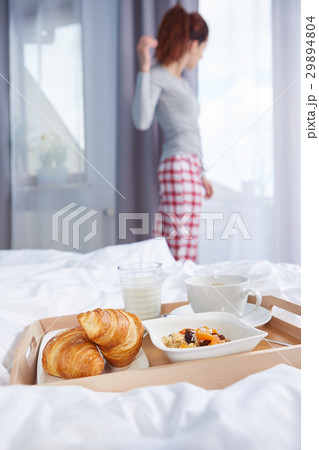 breakfast in bed with coffee and croissants 29894804