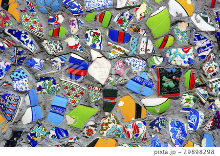 Wall with broken ceramic plates colored fragments  29898298