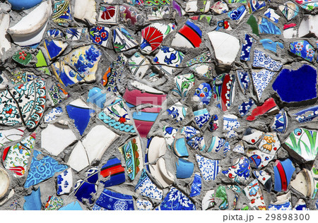 Wall with broken ceramic plates colored fragments Wall with broken ceramic plates colored fragments 29898300