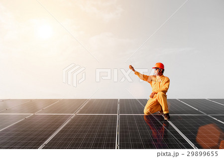 Engineers checking solar panels,Holding the bulb 29899655