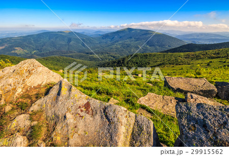huge stones on the meadow on top of mountain ridge 29915562