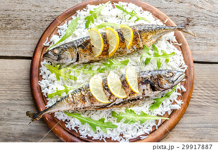 Grilled mackerel with basmati rice and arugula Grilled mackerel with basmati rice and arugula 29917887