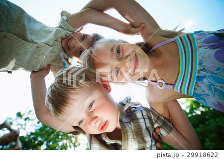 happy children hugging bottom view happy children hugging bottom view 29918622