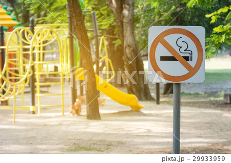 no smoking metal sign in the park. 29933959