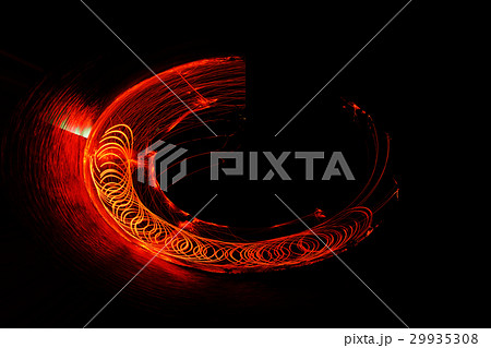 Man playing fire baton in Texture background 29935308