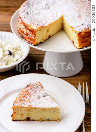 Cheesecake slice on brown wooden background. Cheesecake slice on brown wooden background. 29936882